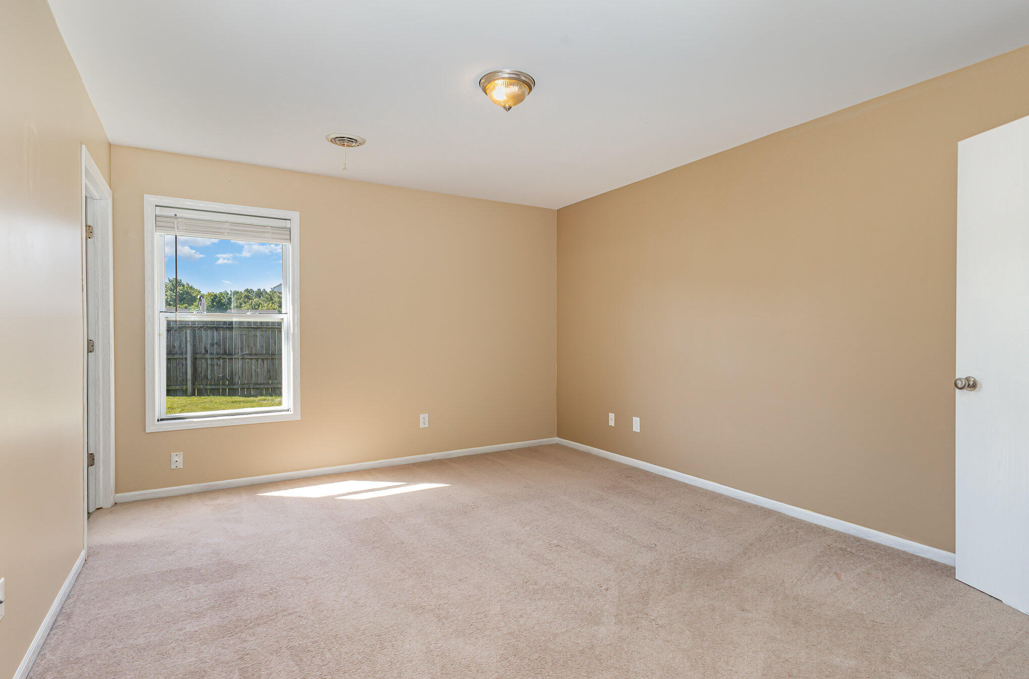 370 South Boo Road Burns Harbor, IN 46304 - Photo 9 of 22 a view of an empty room with a window