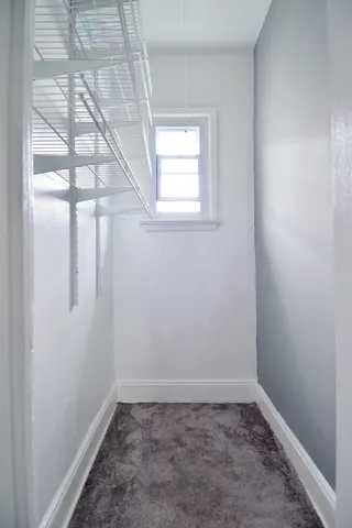 a view of a small space with window in it