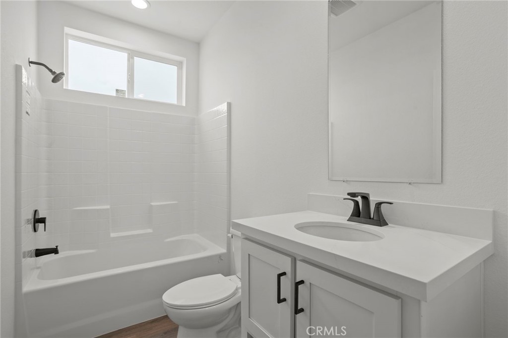 2548 Peck Road, Unit 39 Monrovia, CA 91016 - Photo 17 of 26 a bathroom with a sink a toilet and a bathtub