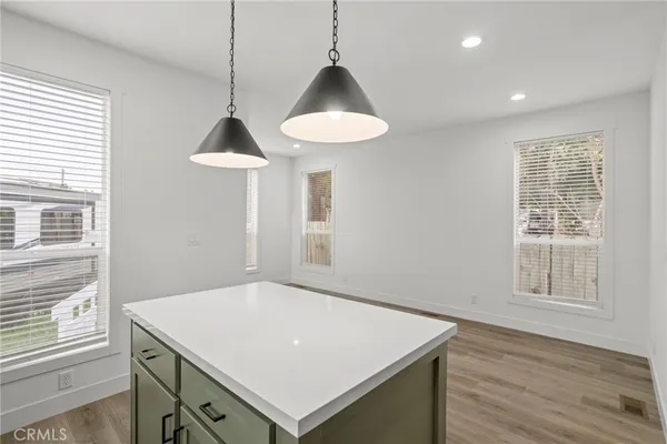 a view of kitchen with furniture and window