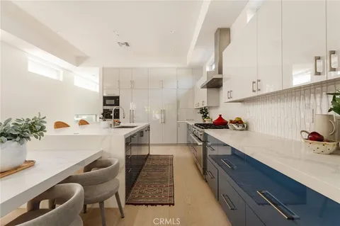 a spacious bathroom with a shower and a sink