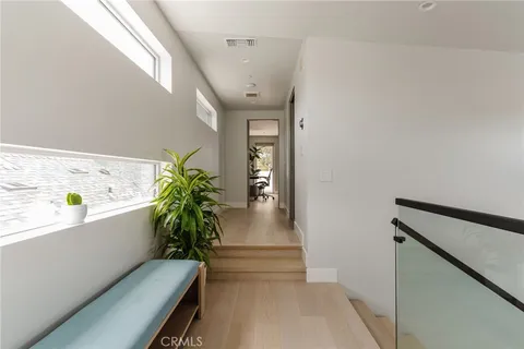 a bed room with a bed and a desk