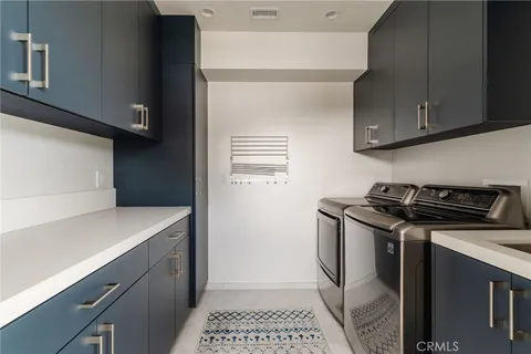 a bedroom with a bed and a mirror