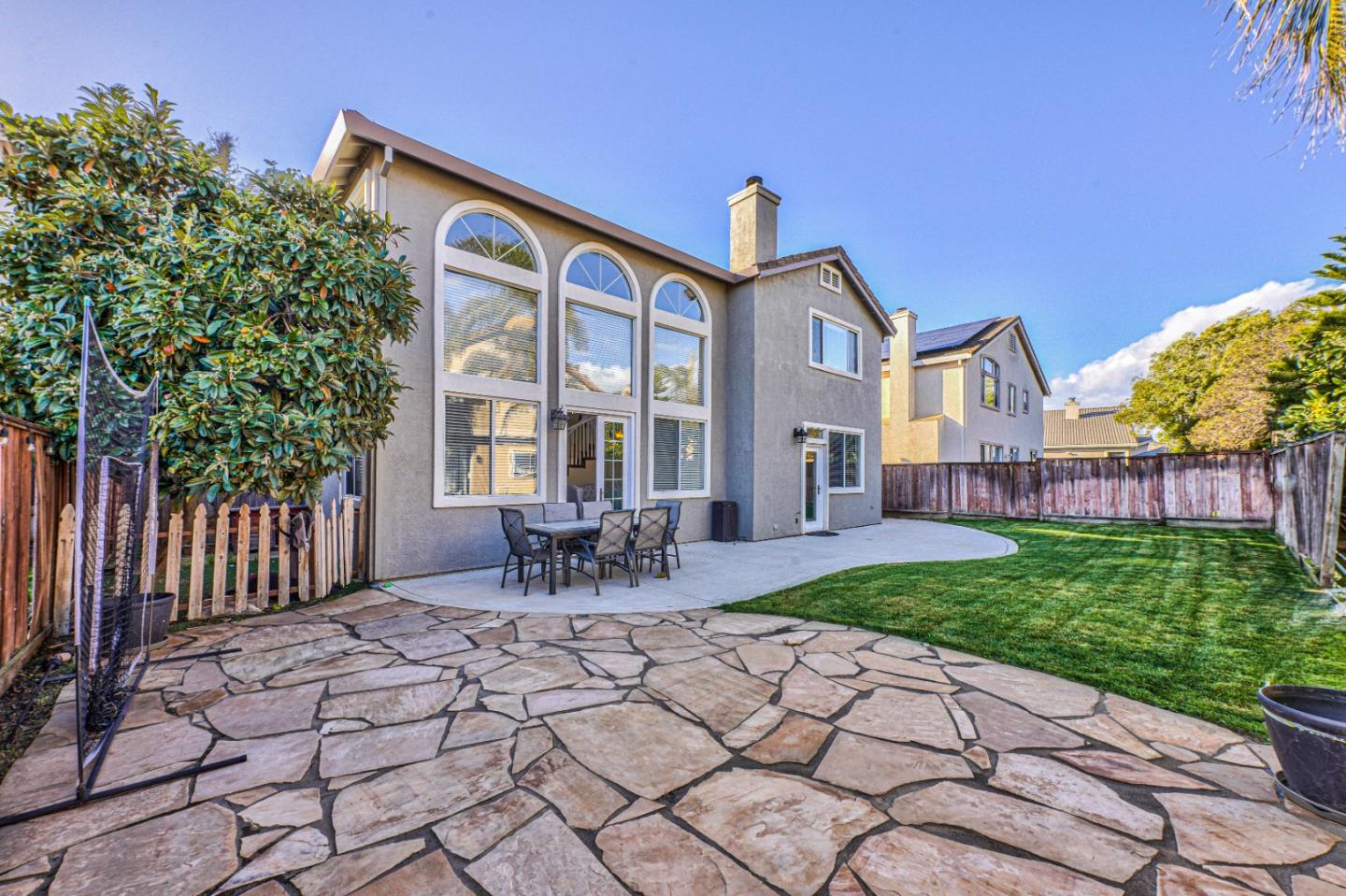 10 Whitman Circle Salinas, CA 93906 - Photo 10 of 33 a patio with table and chairs and potted plants