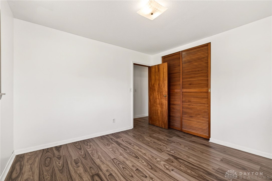 1005 Free Road New Carlisle, OH 45344 - Photo 29 of 43 This bright room features durable flooring and convenient closet storage.