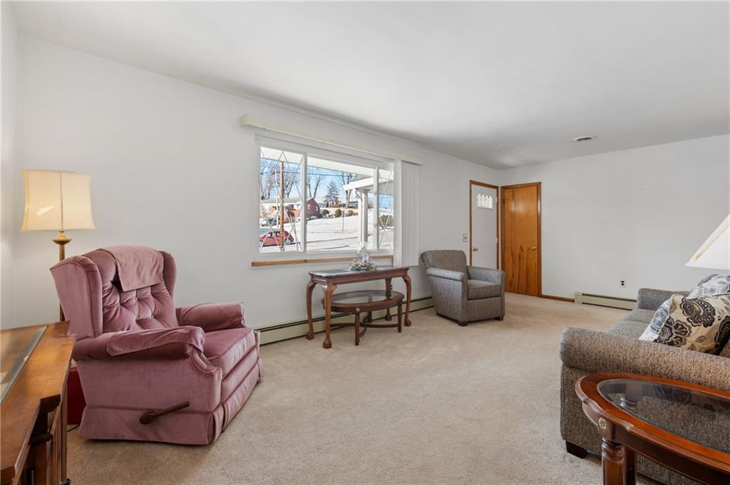 138 Reed Street Lower Burrell, PA 15068 - Photo 8 of 36 Neutral carpeting and soft white walls create a clean backdrop for any style.