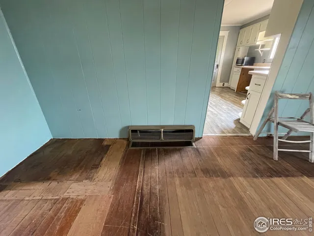 a view of a livingroom with a staircase