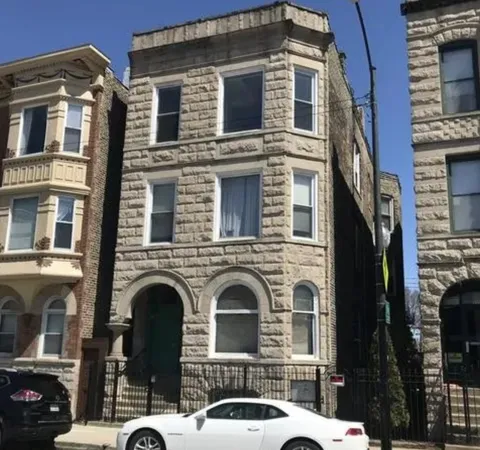 a front view of a house with parking yard