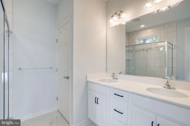 a bathroom with a bathtub and window
