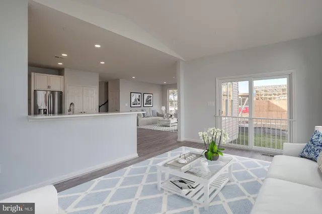 a kitchen with sink and cabinets