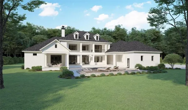a front view of house with yard and green space