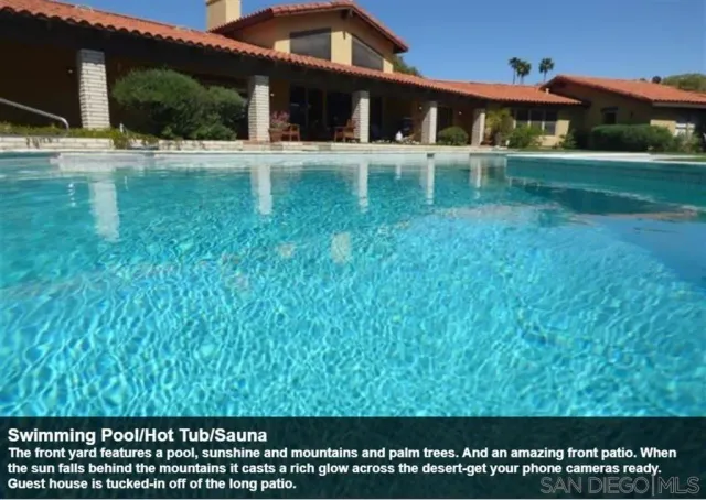 a view of house with a yard