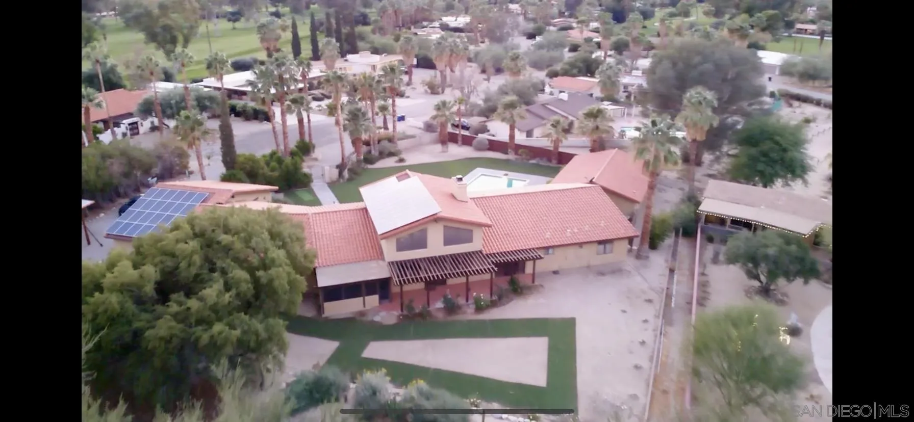438 De Anza Spur Road Borrego Springs, CA 92004 - Photo 6 of 74 an aerial view of a house with yard and sitting area