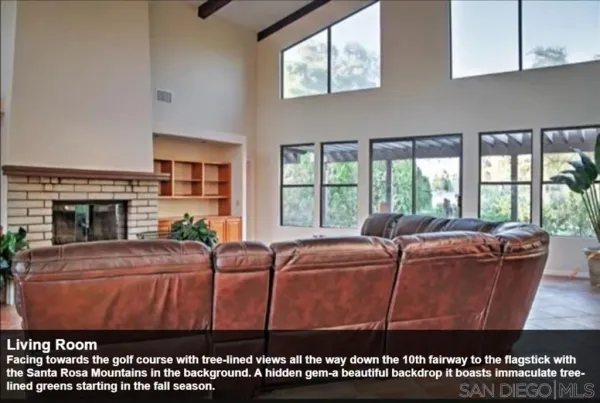 a room with a bed wooden floor and window