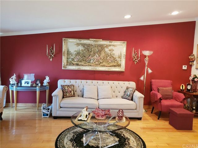 a living room with furniture and a couch