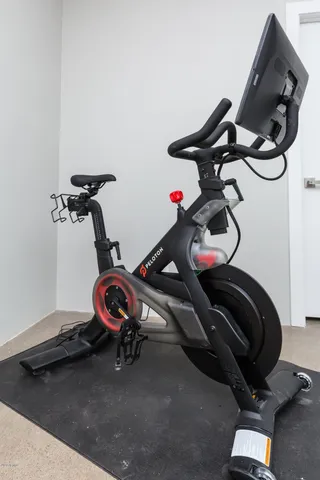 a bathroom with a sink vanity mirror and toilet