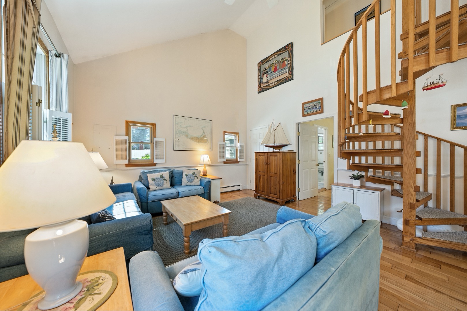 52 Pleasant Street Nantucket, MA 02554 - Photo 7 of 36 a living room with furniture fireplace and a large window
