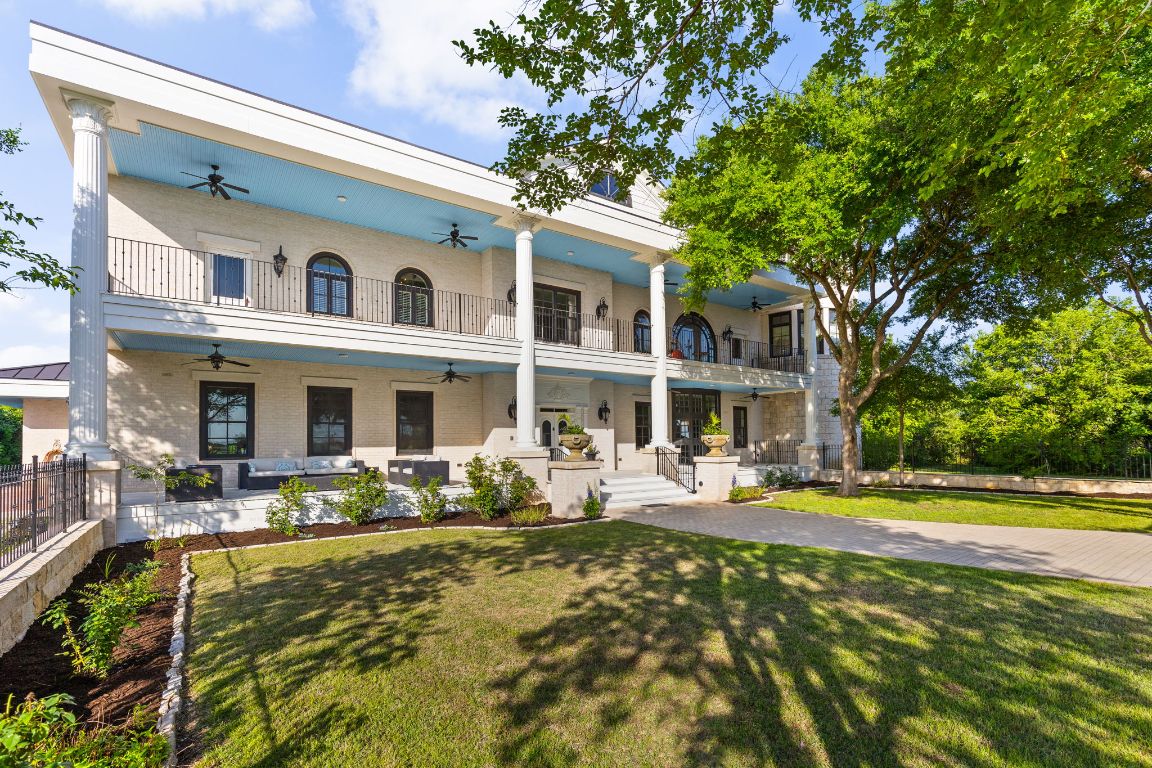999 Schwarzlose Road New Braunfels, TX 78130 - Photo 2 of 39 a front view of a building with garden