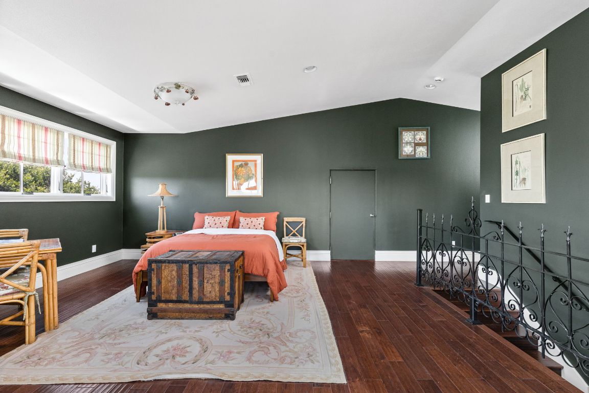 999 Schwarzlose Road New Braunfels, TX 78130 - Photo 22 of 39 a bedroom with wooden floor