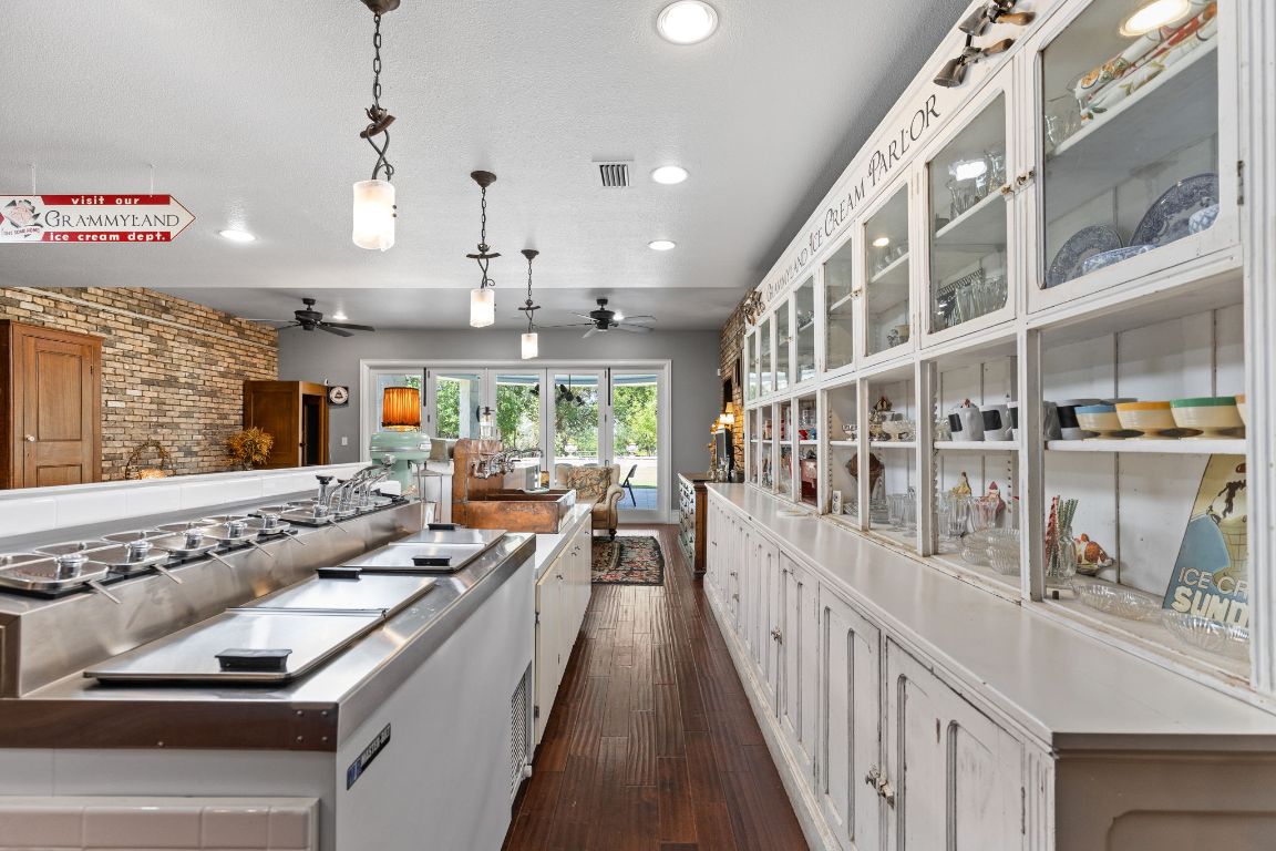 999 Schwarzlose Road New Braunfels, TX 78130 - Photo 25 of 39 a view of a living room and balcony with furniture