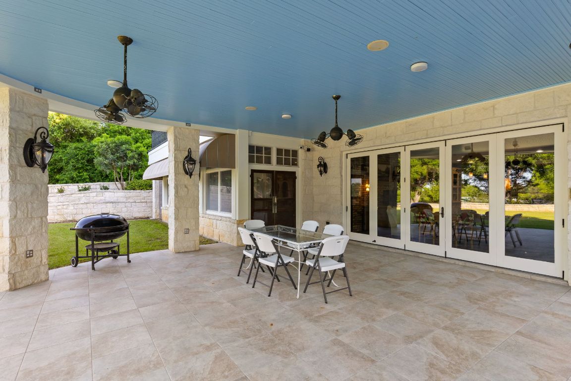 999 Schwarzlose Road New Braunfels, TX 78130 - Photo 27 of 39 a view of a patio with furniture and a garden