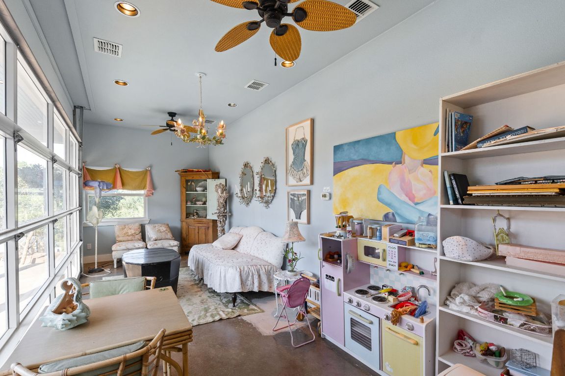 999 Schwarzlose Road New Braunfels, TX 78130 - Photo 33 of 39 a bedroom with furniture and a window