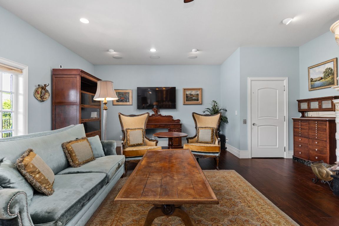 999 Schwarzlose Road New Braunfels, TX 78130 - Photo 5 of 39 a living room with furniture or couch and a flat screen tv
