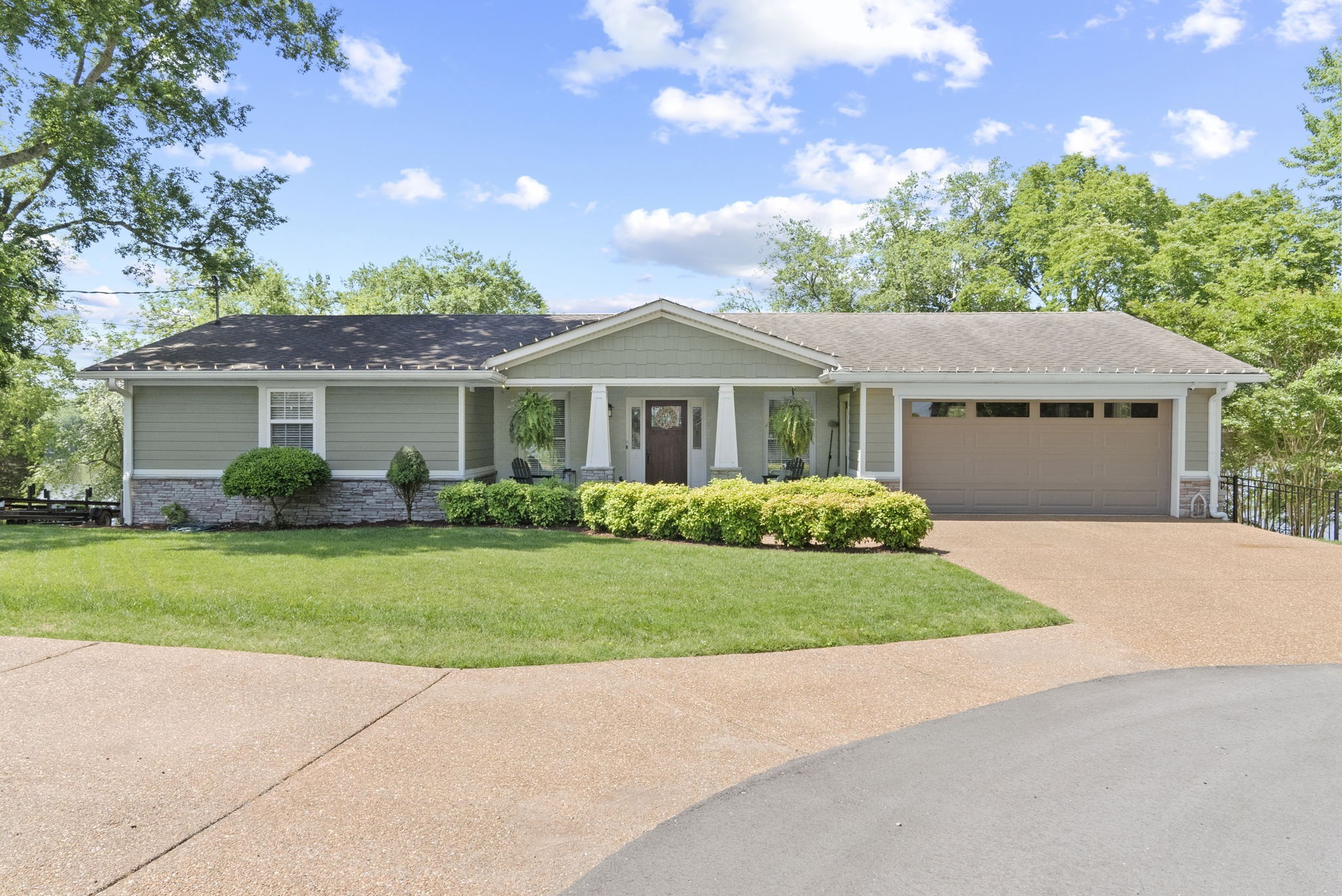 812 Burton Point Road Mount Juliet, TN 37122 - Photo 1 of 59 a front view of a house with a garden