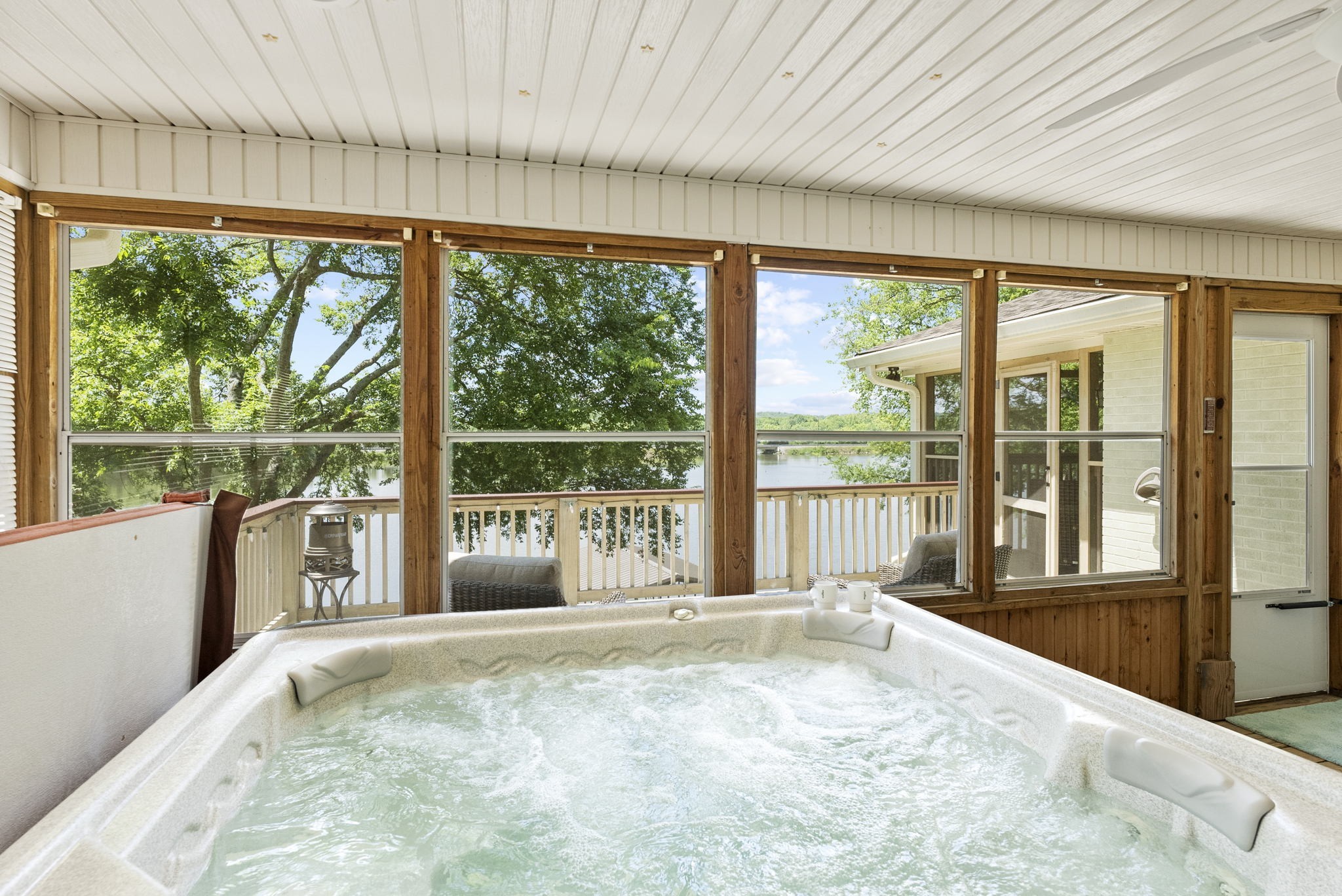 812 Burton Point Road Mount Juliet, TN 37122 - Photo 12 of 59 a large bedroom with a large bed and a large window with outer view