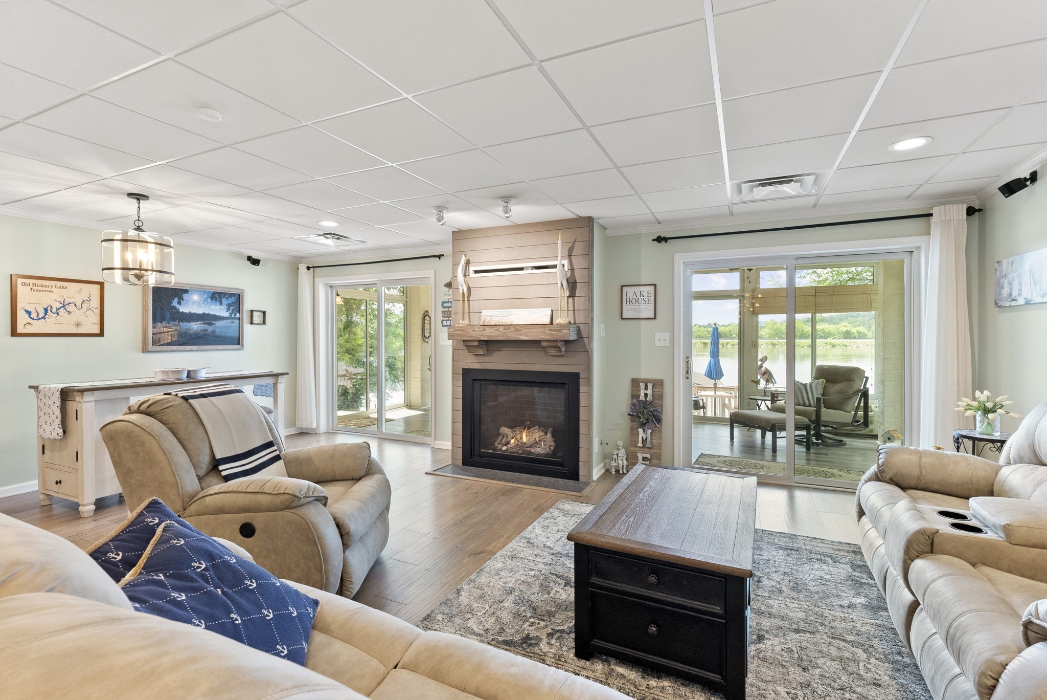 812 Burton Point Road Mount Juliet, TN 37122 - Photo 20 of 59 a living room with furniture large window and fireplace