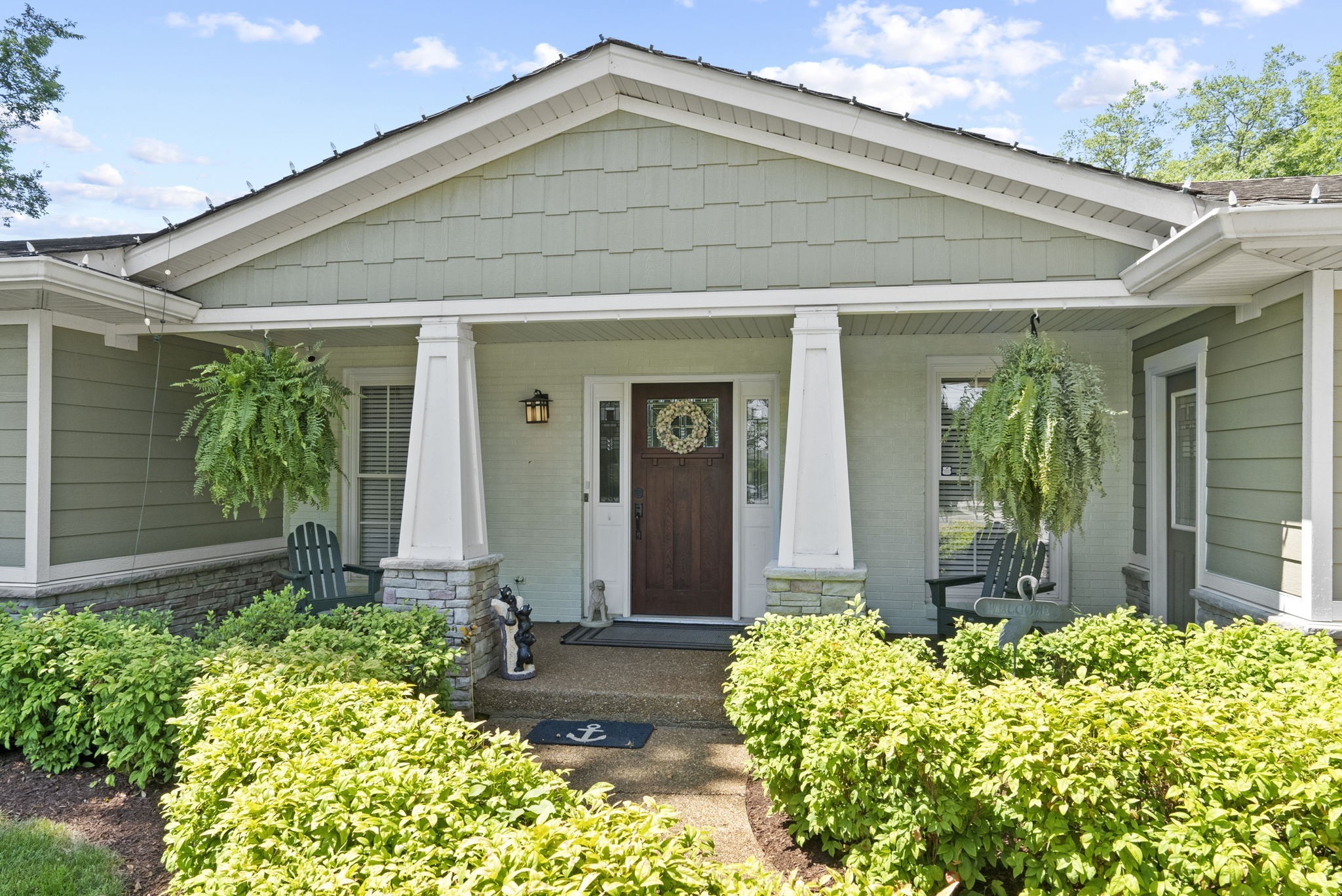 812 Burton Point Road Mount Juliet, TN 37122 - Photo 2 of 59 a front view of a house with garden
