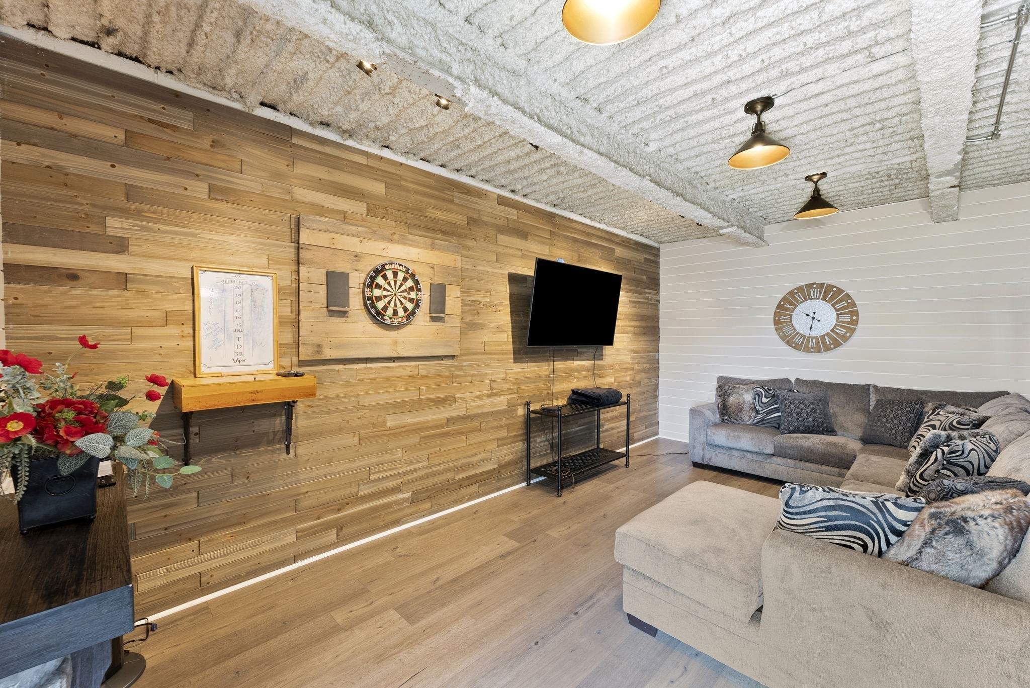 812 Burton Point Road Mount Juliet, TN 37122 - Photo 32 of 59 a living room with furniture and a flat screen tv