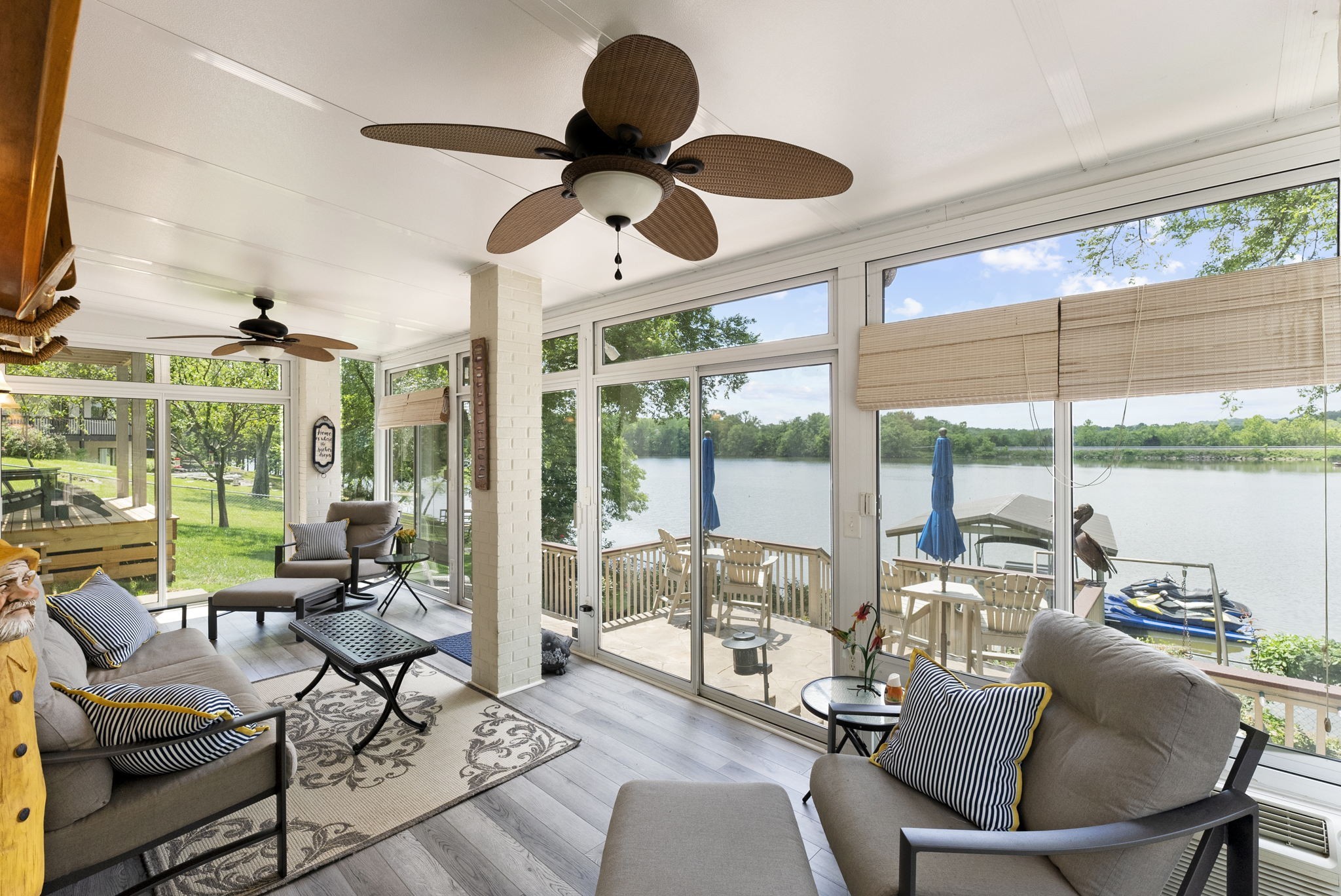 812 Burton Point Road Mount Juliet, TN 37122 - Photo 35 of 59 a living room with patio furniture and a large window