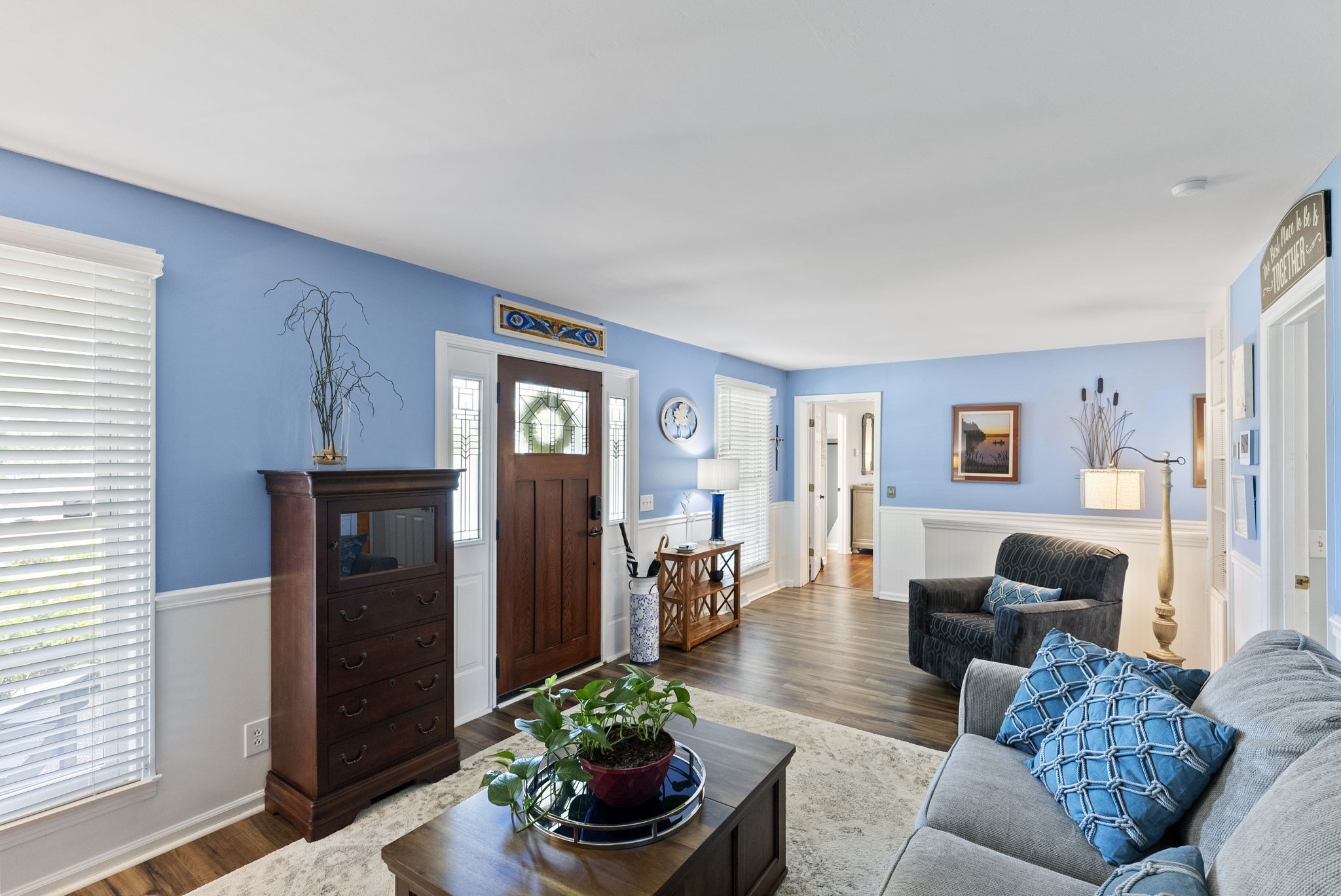 812 Burton Point Road Mount Juliet, TN 37122 - Photo 4 of 59 a living room with furniture and a potted plant