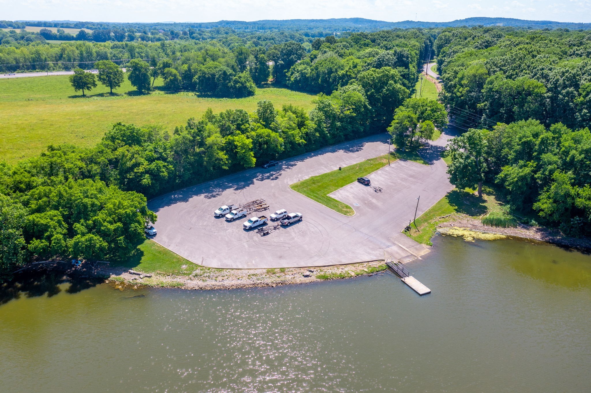 812 Burton Point Road Mount Juliet, TN 37122 - Photo 52 of 59 an aerial view of a house with a garden and lake view