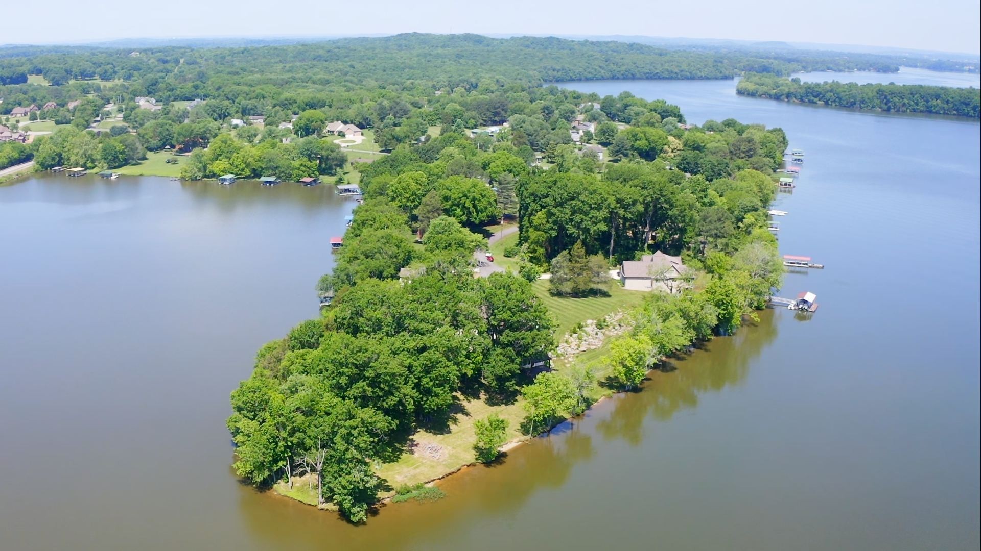 812 Burton Point Road Mount Juliet, TN 37122 - Photo 54 of 59 an aerial view of a houses with a yard and lake view