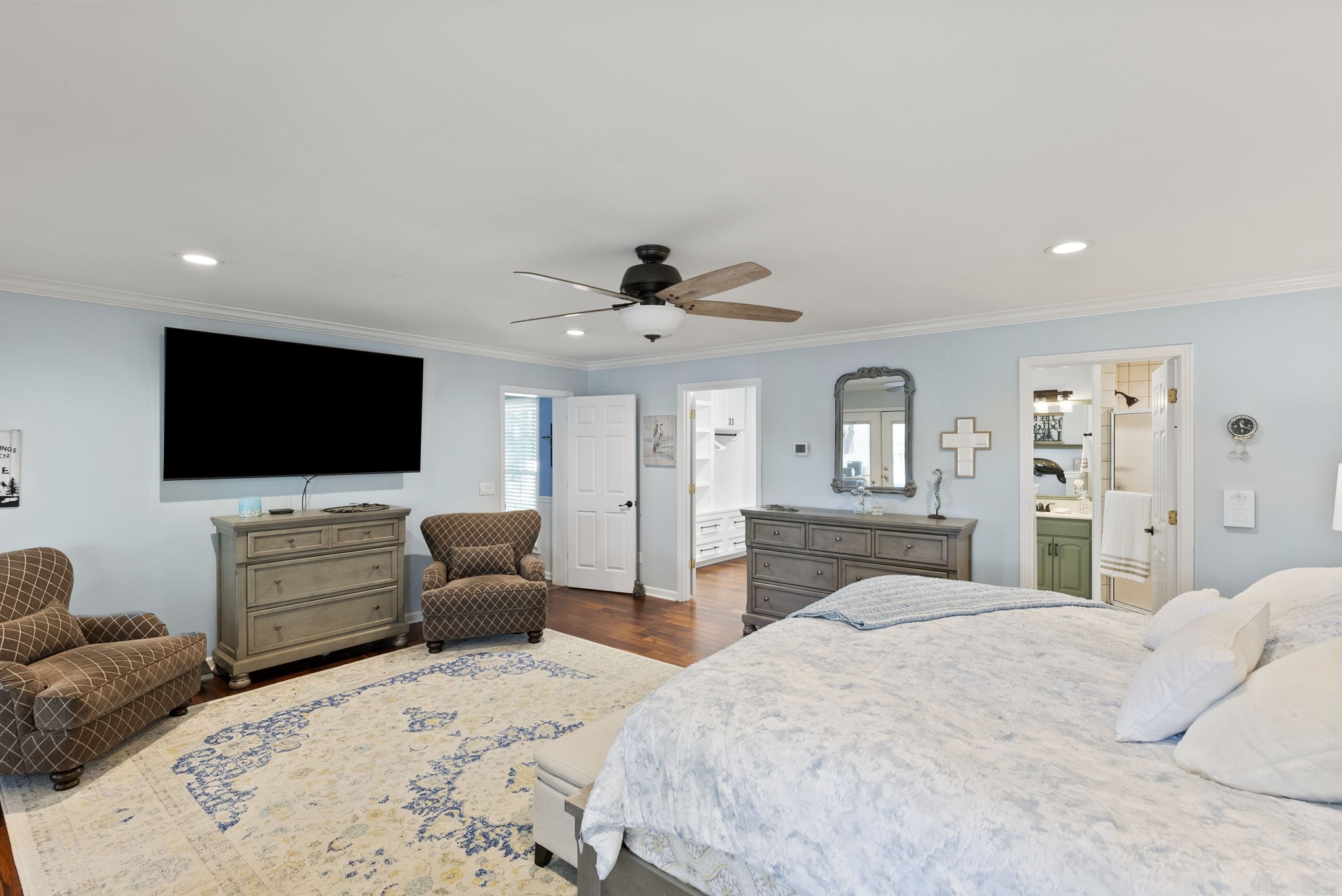 812 Burton Point Road Mount Juliet, TN 37122 - Photo 8 of 59 a bedroom with a bed and a flat screen tv