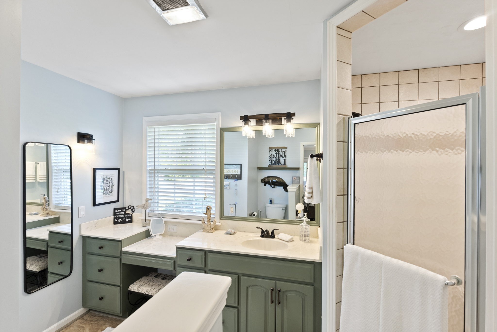 812 Burton Point Road Mount Juliet, TN 37122 - Photo 10 of 59 a bathroom with a sink double vanity and a mirror
