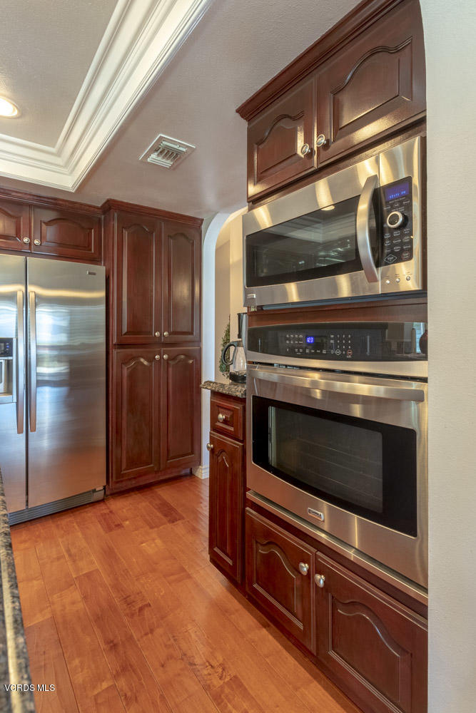 1795 Rambling Road Simi Valley, CA 93065 - Photo 17 of 60 a stove top oven sitting inside of a kitchen