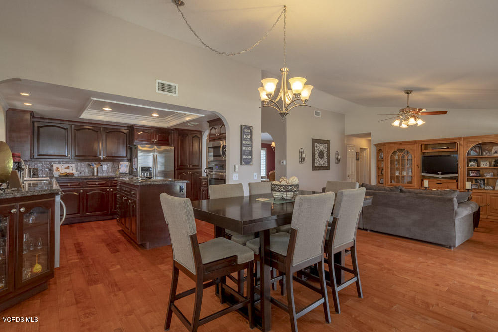 1795 Rambling Road Simi Valley, CA 93065 - Photo 18 of 60 a view of a dining room with furniture and wooden floor