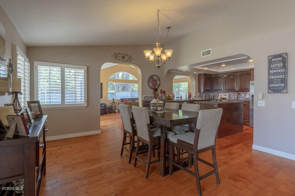 1795 Rambling Road Simi Valley, CA 93065 - Photo 20 of 60 a view of a dining room with furniture and chandelier