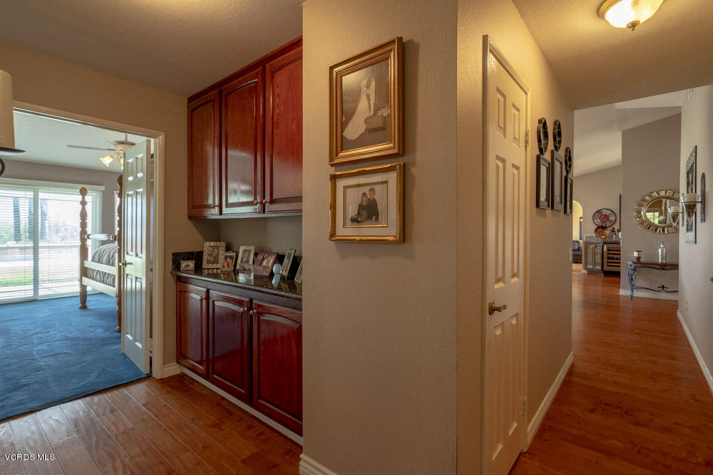 1795 Rambling Road Simi Valley, CA 93065 - Photo 27 of 60 a view of a kitchen from the hallway
