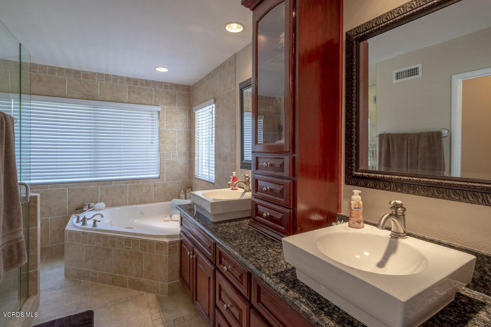 1795 Rambling Road Simi Valley, CA 93065 - Photo 30 of 60 a bathroom with a sink and a bathtub