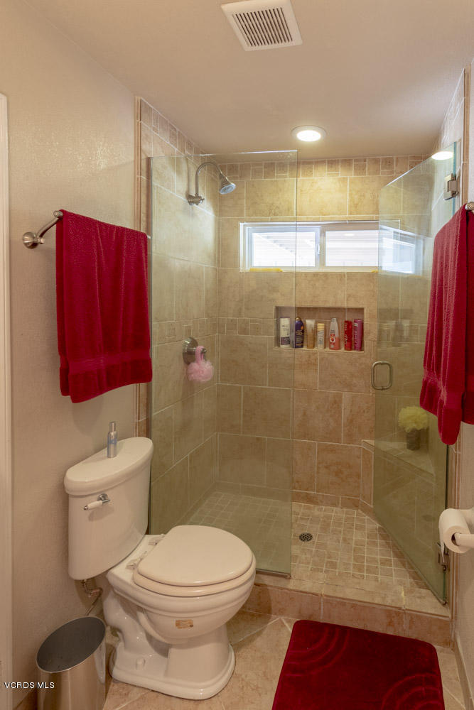 1795 Rambling Road Simi Valley, CA 93065 - Photo 35 of 60 a bathroom with a toilet and a shower