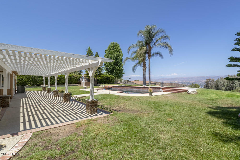 1795 Rambling Road Simi Valley, CA 93065 - Photo 39 of 60 a view of a house with backyard and porch