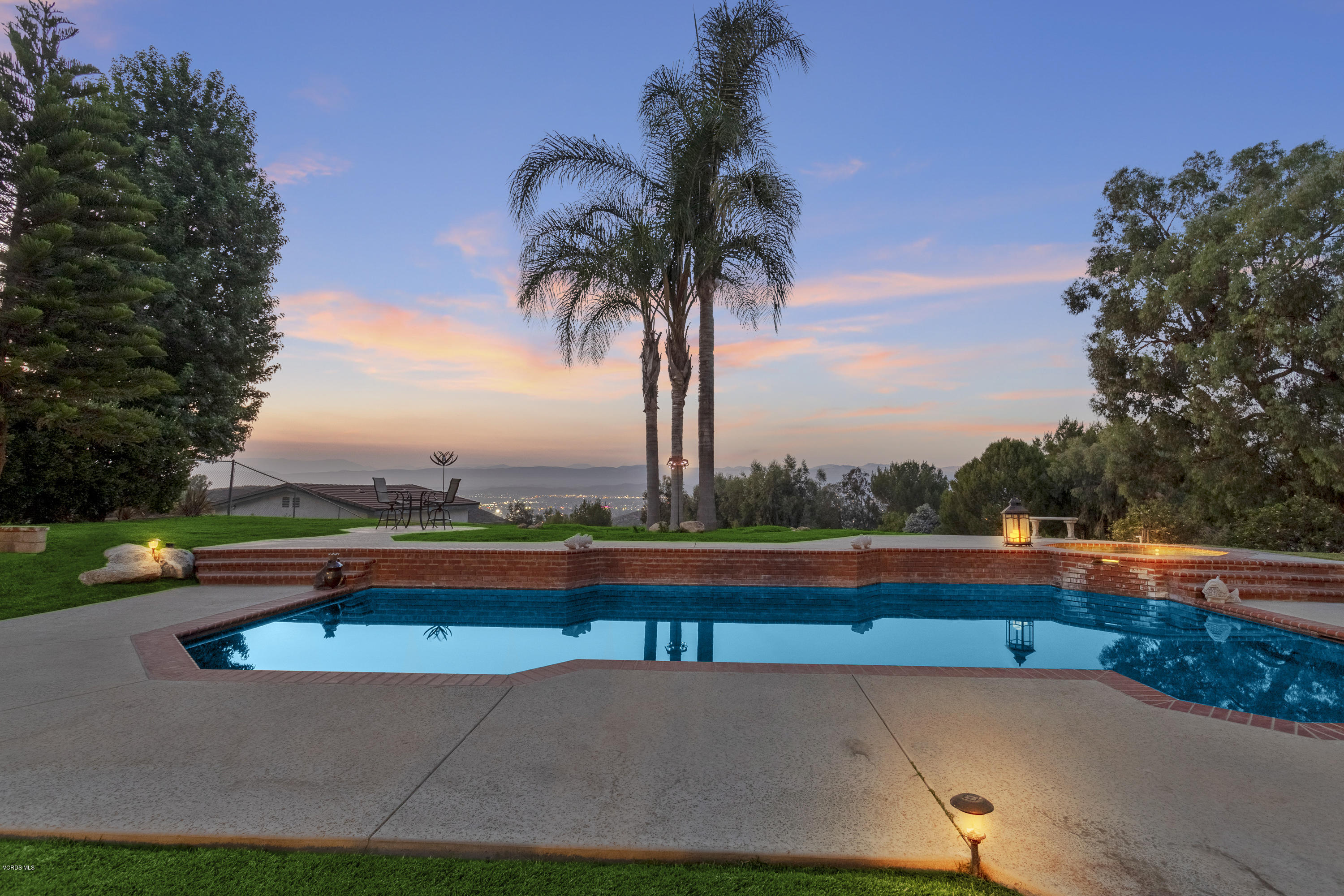 1795 Rambling Road Simi Valley, CA 93065 - Photo 40 of 60 a view of swimming pool with a table and chairs
