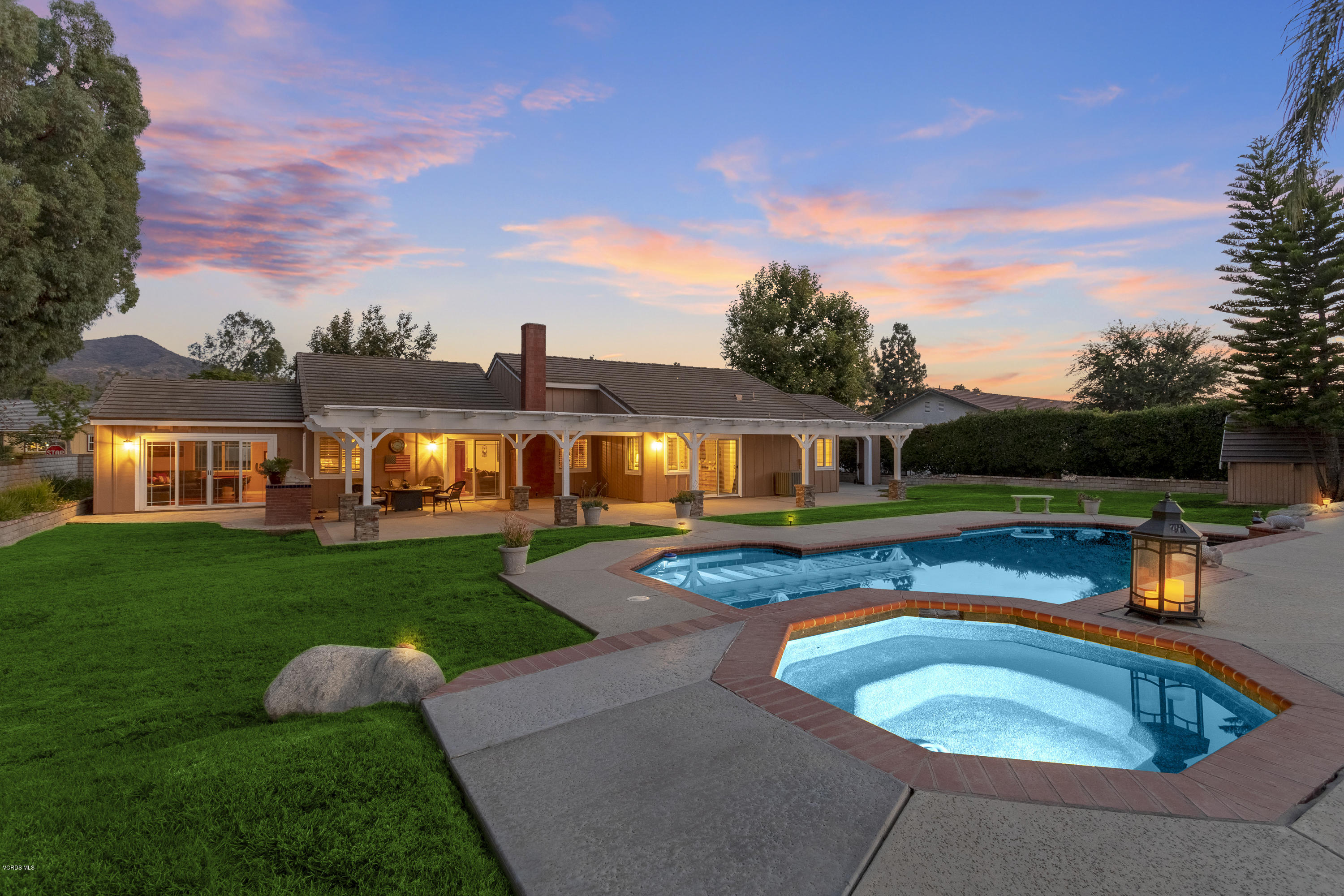 1795 Rambling Road Simi Valley, CA 93065 - Photo 43 of 60 a view of a house with swimming pool and a yard