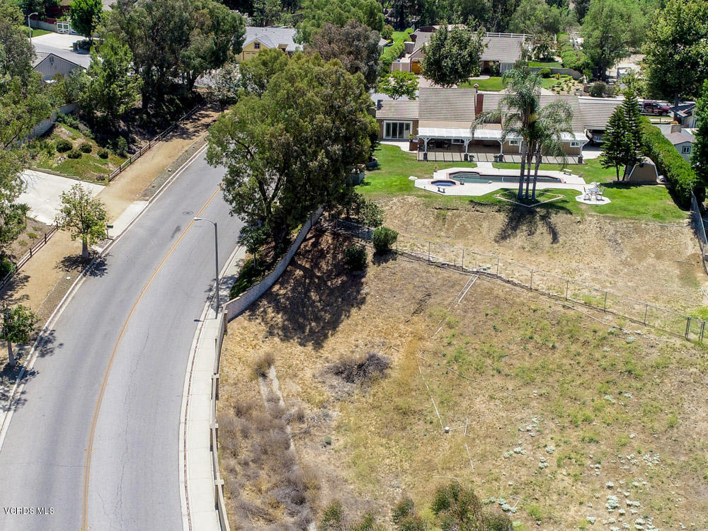 1795 Rambling Road Simi Valley, CA 93065 - Photo 57 of 60 an aerial view of a house with a yard and lake view