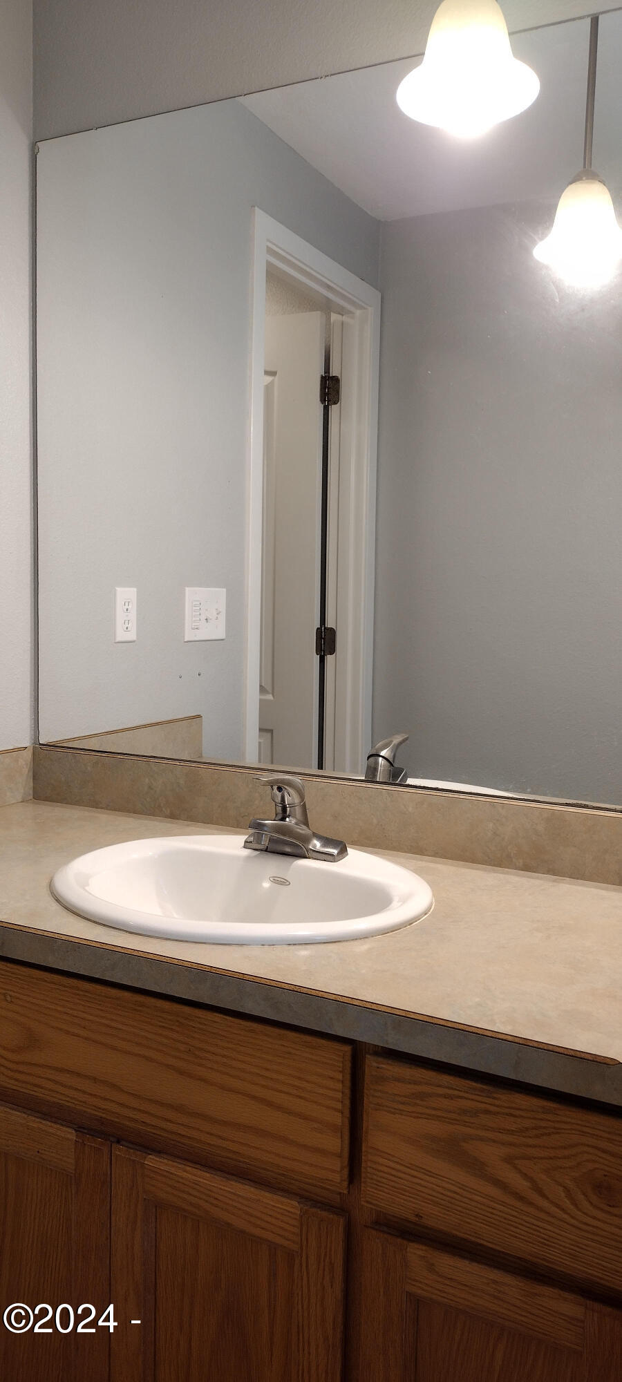 630 Southwest Fall Street Newport, OR 97365 - Photo 20 of 28 Downstairs Bath Vanity