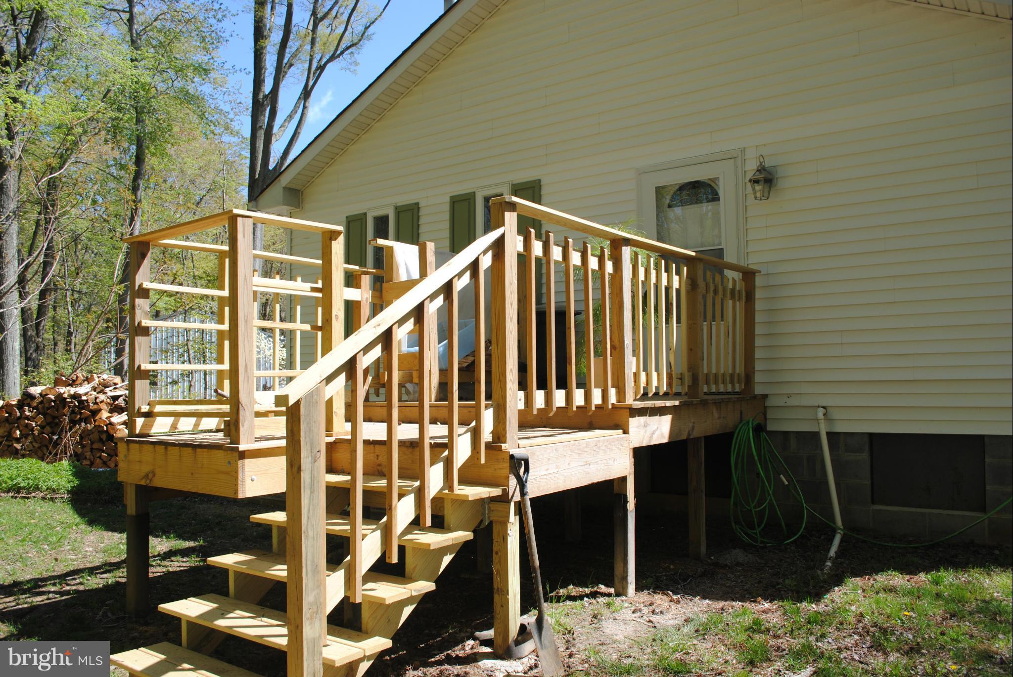 5754 Crosby Road Rock Hall, MD 21661 - Photo 17 of 26 Side deck for wood storage